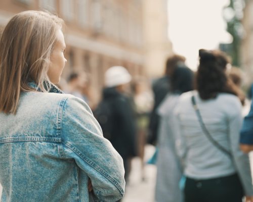 Female tourist on sightseeing tours in the old town.